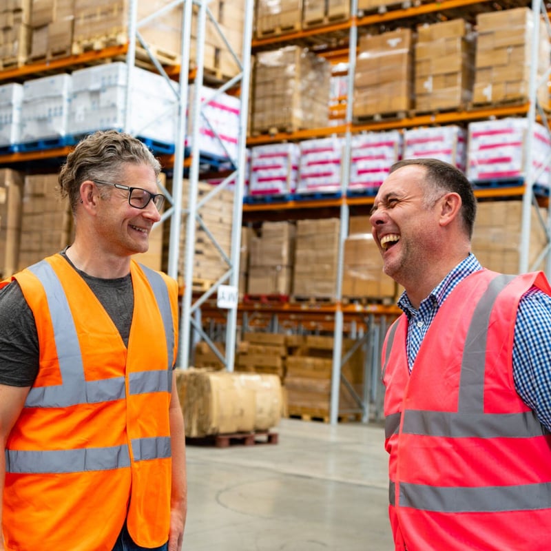 2-people-talking-in-warehouse-Blog-internal-half