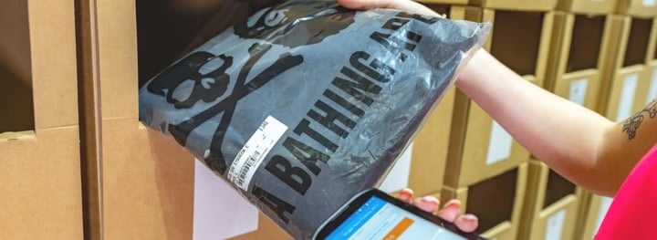 Image of BAPE product being picked in the warehouse