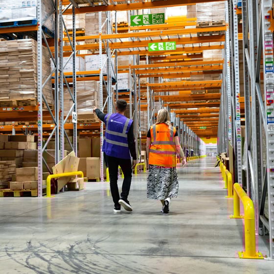 clients-walking-through-warehouse